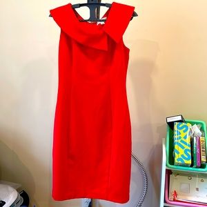 A beautiful Harper Rose red orange color dress. Size 2. Never been worn.
